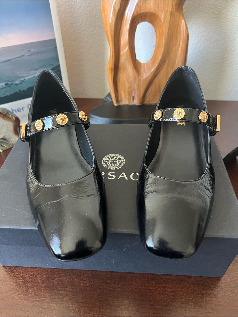 New! Versace Black Patent Leather Mary Jane Flats with Gold Medallion Strap.